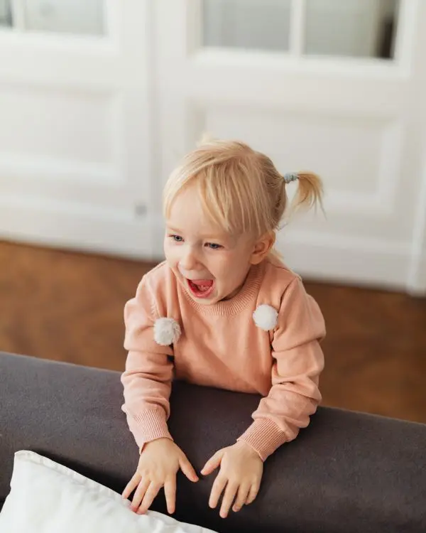 A laughing toddler girl