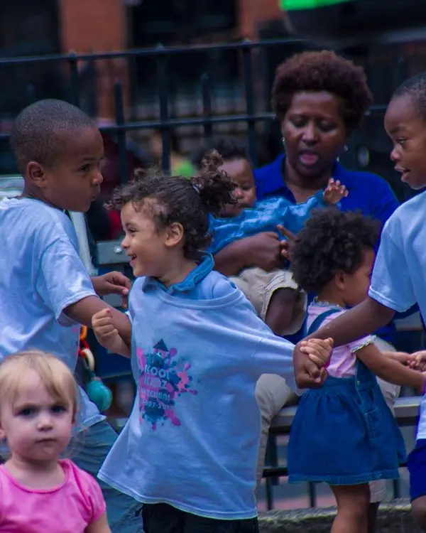 A joyful group of young children playing together